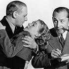 Ben Bernie, Alice Faye, and Walter Winchell in Wake Up and Live (1937)