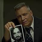 Charles Manson and Holt McCallany in Mindhunter (2017)