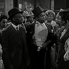 Johnny Lee, Bill Robinson, Nick Stewart, and Dooley Wilson in Stormy Weather (1943)