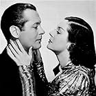 Robert Montgomery and Rosalind Russell in Live, Love and Learn (1937)