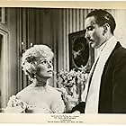 Christopher Lee and Eva Gabor in The Truth About Women (1957)