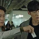 Jo Hie-bong and Choi Jin-hyuk in Tunnel (2017)