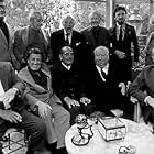 Directors Group, Nov.1972. George Cukor Hosts a party for Luis Bunuel. Back Row from left: Robert Mulligan, William Wyler, George Cukor, Robert Wise, Jean-Claude Carriere, and Serge Silverman.  Front Row from left: Billy Wilder, George Stevens, Luis Bunuel, Alfred Hitchcock, and Rouben Mamoulin.