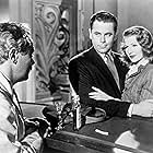 Rita Hayworth, Glenn Ford, and Steven Geray in Gilda (1946)