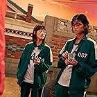 Lee Yoo-mi and Hoyeon in Squid Game (2021)