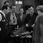 Edward G. Robinson, Ward Bond, Curt Bois, Allen Jenkins, Vladimir Sokoloff, and Claire Trevor in The Amazing Dr. Clitterhouse (1938)