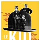 Charles Chaplin, Jackie Coogan, and Tom Wilson in The Kid (1921)