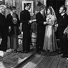 Claude Rains, Ralph Byrd, Jean Gabin, Chester Gan, William Halligan, Vera Lewis, Ida Lupino, and Tully Marshall in Moontide (1942)