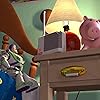 Tim Allen and John Ratzenberger in Toy Story (1995)