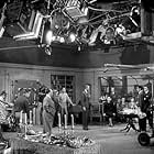 James Stewart, Alfred Hitchcock, and Cast on the set of "Rope." 1948 Warner