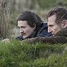 Liam Neeson and Jack Gleeson in In the Land of Saints and Sinners (2023)