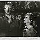 Robert Mitchum, Barbara Bel Geddes, and Bud Osborne in Blood on the Moon (1948)