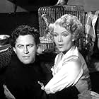 Jean Kent and John McCallum in Five Angles on Murder (1950)