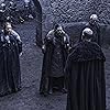 Liam Cunningham, Tim McInnerny, Kit Harington, and Sophie Turner in Game of Thrones (2011)