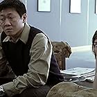 Kelly Macdonald and Benedict Wong in State of Play (2003)