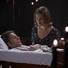 Brenda Bakke and Gary Cole in American Gothic (1995)