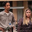 Jessie Ennis and Danny Pudi in To Catch a Mouse (2022)