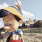 Joseph Gordon-Levitt and Benjamin Evan Ainsworth in Pinocchio (2022)
