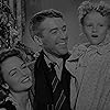 James Stewart, Donna Reed, and Karolyn Grimes in It's a Wonderful Life (1946)