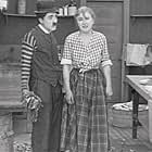 Charles Chaplin and Edna Purviance in Triple Trouble (1918)
