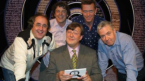 Stephen Fry, Danny Baker, Alan Davies, Hugh Laurie, and John Sessions in QI (2003)
