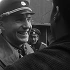 Ralph Fiennes and Jonathan Sagall in Schindler's List (1993)