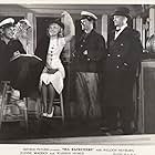 Weldon Heyburn, Warren Hymer, and Penny Singleton in Sea Racketeers (1937)