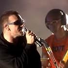 Bono, Adam Clayton, and U2 in U2: PopMart Live from Mexico City (1997)