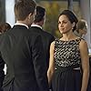 Patrick J. Adams and Meghan Markle in Suits (2011)