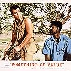 Rock Hudson and Sidney Poitier in Something of Value (1957)