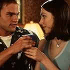 Seann William Scott and Eden Riegel in American Pie (1999)