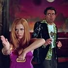 (L-r) Daphne (SARAH MICHELLE GELLAR) and Emile Mondavarious (ROWAN ATKINSON) in Warner Bros. Pictures' live-action comedy "Scooby-Doo."