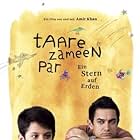 Aamir Khan, Tanay Chheda, and Darsheel Safary in Like Stars on Earth (2007)