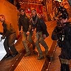 Brad Pitt, Grégory Fitoussi, John Gordon Sinclair, and Elyes Gabel in World War Z (2013)