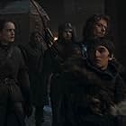 Alfie Allen, Isaac Hempstead Wright, and Megan Parkinson in Game of Thrones (2011)