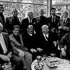Directors Group, Nov. 1972. George Cukor Hosts a party for Luis Bunuel. Back Row from left: Robert Mulligan, William Wyler, George Cukor, Robert Wise, Jean-Claude Carriere, and Serge Silverman.  Front Row from left: Billy Wilder, George Stevens, Luis Bunuel, Alfred Hitchcock, and Rouben Mamoulin.