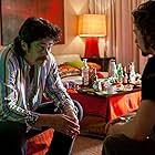 Benicio Del Toro and Aaron Taylor-Johnson in Savages (2012)