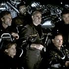 (Beginning lower left and clockwise) Hilary Swank as Beck, Aaron Eckhart as Josh, Delroy Lindo as Brazzleton, Stanley Tucci as Zimsky, Bruce Greenwood as Richard, and Tchely Karyo as Serge.