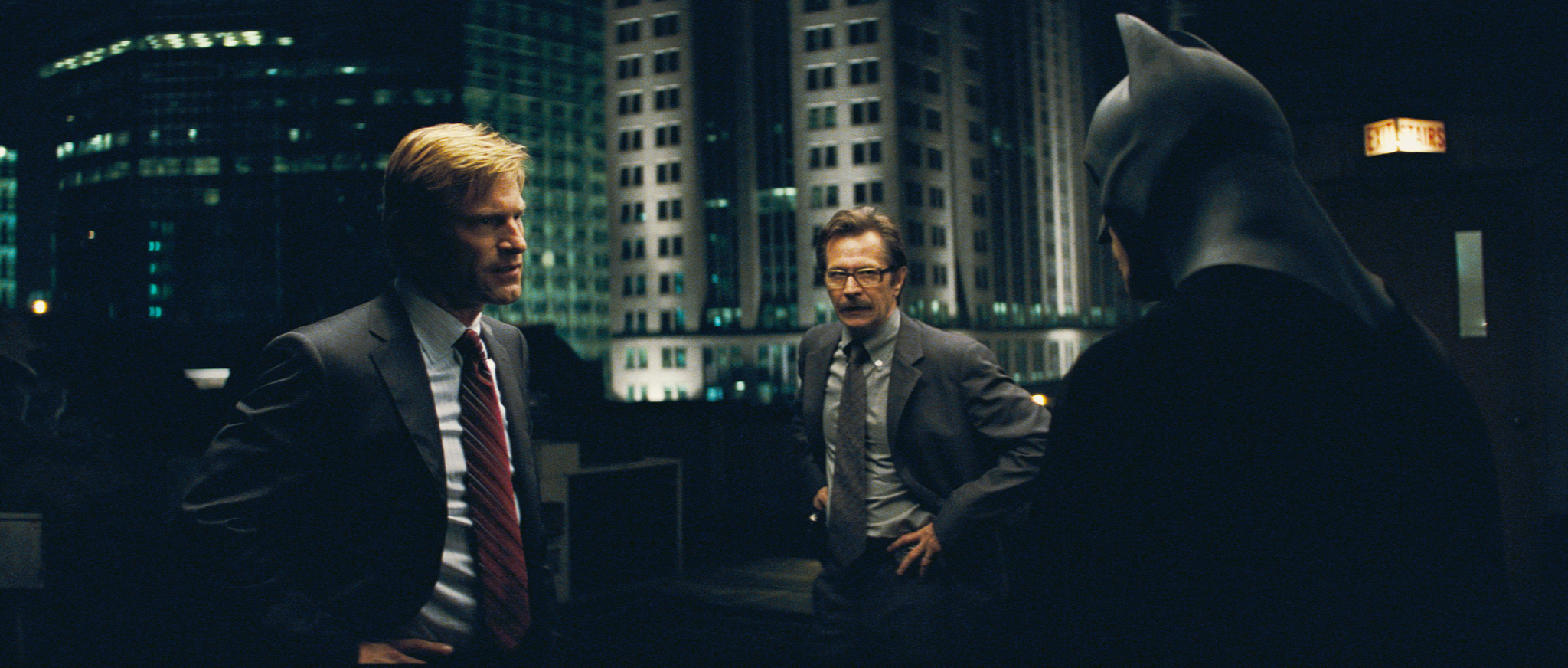 Gary Oldman, Christian Bale, and Aaron Eckhart in The Dark Knight (2008)