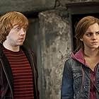 Rupert Grint and Emma Watson in Harry Potter and the Deathly Hallows: Part 2 (2011)