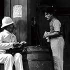 Charles Chaplin and Albert Austin in City Lights (1931)