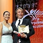 Gong Li and Mads Mikkelsen at an event for The Hunt (2012)