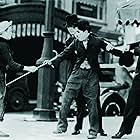 Charles Chaplin, Austen Jewell, and Robert Parrish in City Lights (1931)