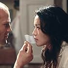 Jason Statham and Shu Qi in The Transporter (2002)