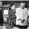 Judy Garland, Richard Widmark, and Howard Caine in Judgment at Nuremberg (1961)