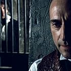 Robert Downey Jr. and Mark Strong in Sherlock Holmes (2009)