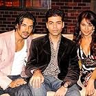 Bipasha Basu, Karan Johar, and John Abraham in Koffee with Karan (2004)