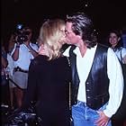 Goldie Hawn and Kurt Russell at an event for Escape from L.A. (1996)