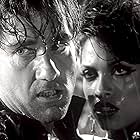 Rosario Dawson and Clive Owen in Sin City (2005)
