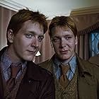 David Thewlis, James Phelps, and Oliver Phelps in Harry Potter and the Deathly Hallows: Part 1 (2010)